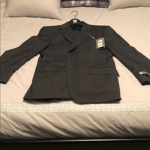 Suit by Joseph Abboud.